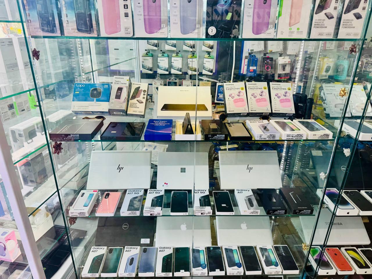 Certified pre-owned iPhones, Galaxy phones and laptops in the PHONE LAND display case